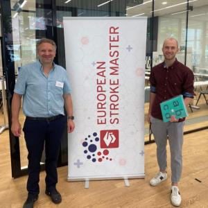 Portrait of Simon Jung and David Tanner with Stroke MAS Banner
